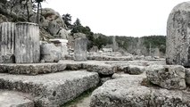 Woman Takes a Picture Among Ruins - Stock Footage | VideoHive 15434655