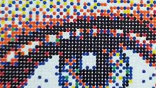 This artist makes photorealistic portraits out of 130,000 tiny circles