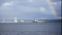 Semi Submersible Oil Rigs And Rainbow At Cromarty Firth In Invergordon, Scotland Stock Footage Video