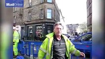 Workman spits on local resident for taking photos of roadworks
