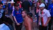Euro 2016: a Portuguese child consoles a French supporter in tears