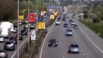 Traffic on the M1-M6 Motorway junction dual carriageway. Time lapse.. Stock Footage