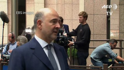 EU's Moscovici urges Britain's May to 'accelerate' Brexit