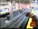 Woman Falls Onto Subway Tracks