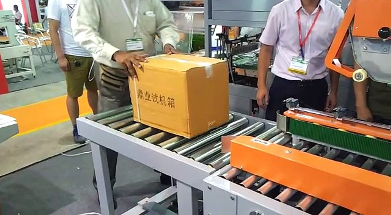 Italian Collaborated Demo Video for Automatic Carton Sealer Machine With Auto Strapping Machine From(Sheikh Khajoo Bhai