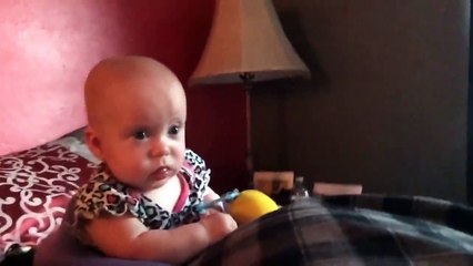 Her reaction to the sound her dad makes is hilarious!