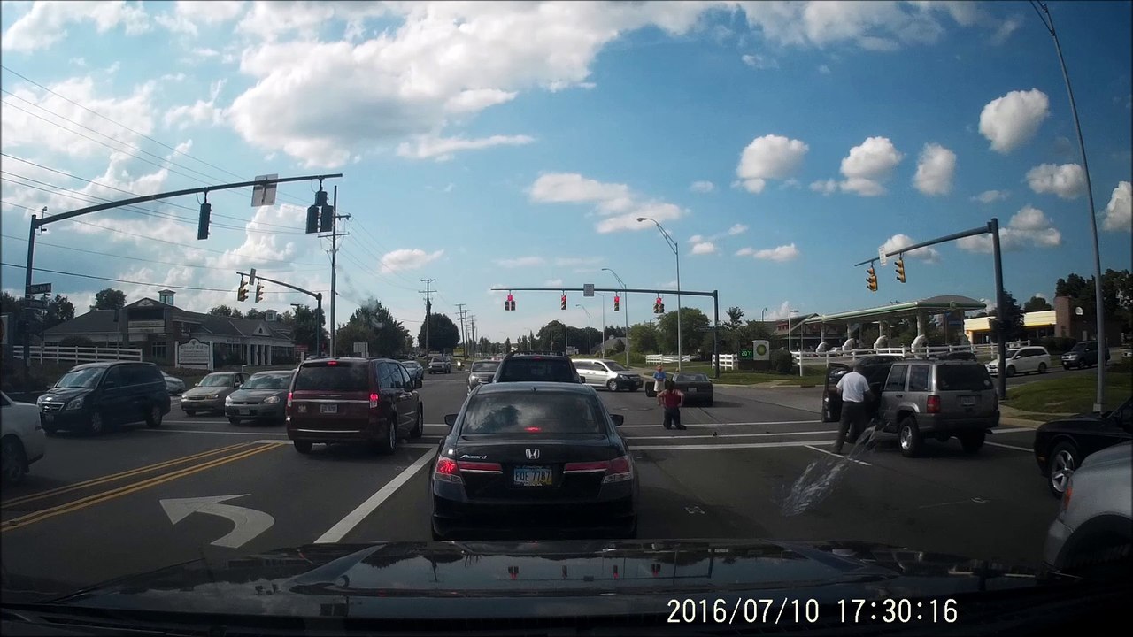 Motorcycle Gets Rear Ended at Stop Light