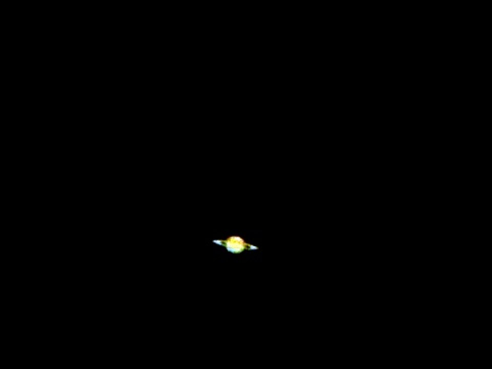 Saturn through 8" Skywatcher dobsonian telescope 2011.04.25 video