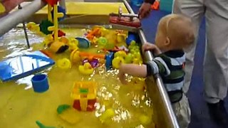 Lincoln (NE) Children's Museum - playing with the duck pond - 15 months