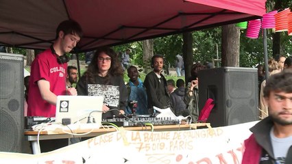 Volunteers organise dance party for migrants in Paris