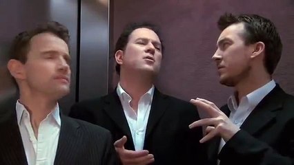 Three sommeliers in a lift