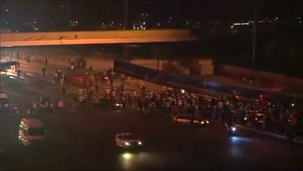 Turkish PM urges people to take to streets in support of govt