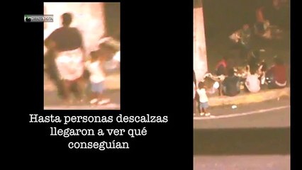 Camión del aseo se detuvo para que varias personas comieran de la basura