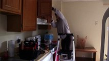 Donna Metzger cleaning cabinets May 2016