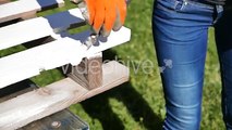 Beautiful Girl Painting a Pallet of White Part 2 - Stock Footage | VideoHive 15503656
