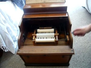 Celestina 20 note paper roll organ plays The Mikado