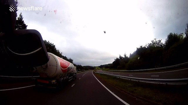 Truck narrowly misses gas tanker in dangerous overtaking manoeuvre