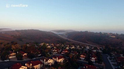 Beautiful drone footage of fog rolling through California hills
