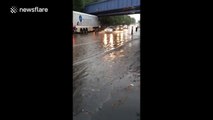 Glasgow street flooded after thunderstorm