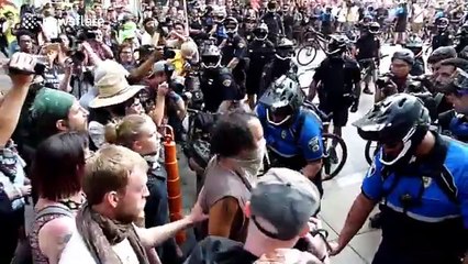Cleveland police push protesters using bikes