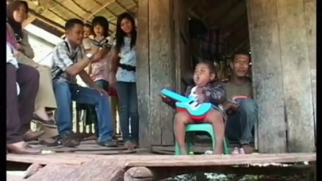 Indonesian baby on 40 cigarettes a day