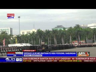 Video herunterladen: Ribuan Personel TNI-Polisi Ikuti Apel Operasi Lilin di Monas