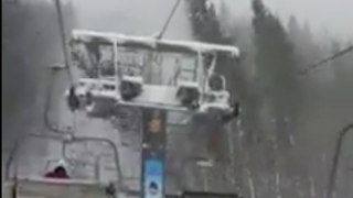 A tree falls onto a chairlift