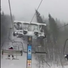 A tree falls onto a chairlift
