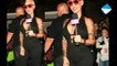 Amber Rose shows off her cleavage in a svelte jumpsuit