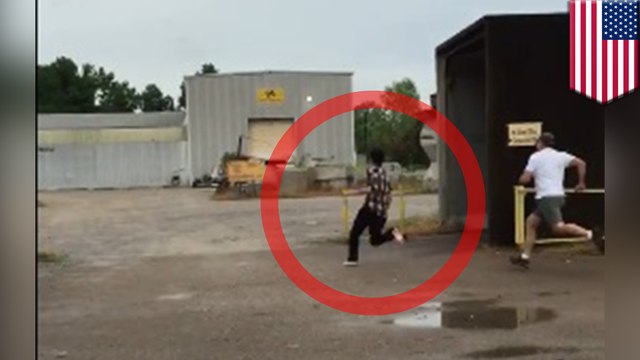 Prisoner thrown from car: Perp gets ejected from police car after crash, tries to flee - TomoNews