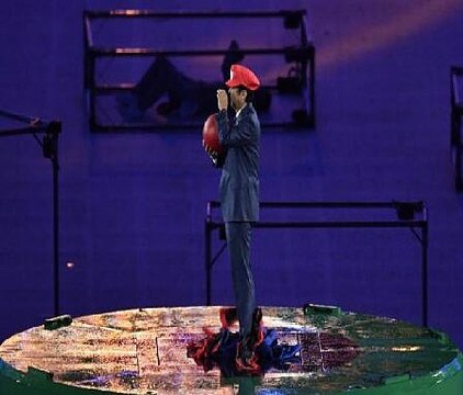 Shinzo Abe emerges from a green pipe disguised as Super Mario during Rio Closing Ceremony