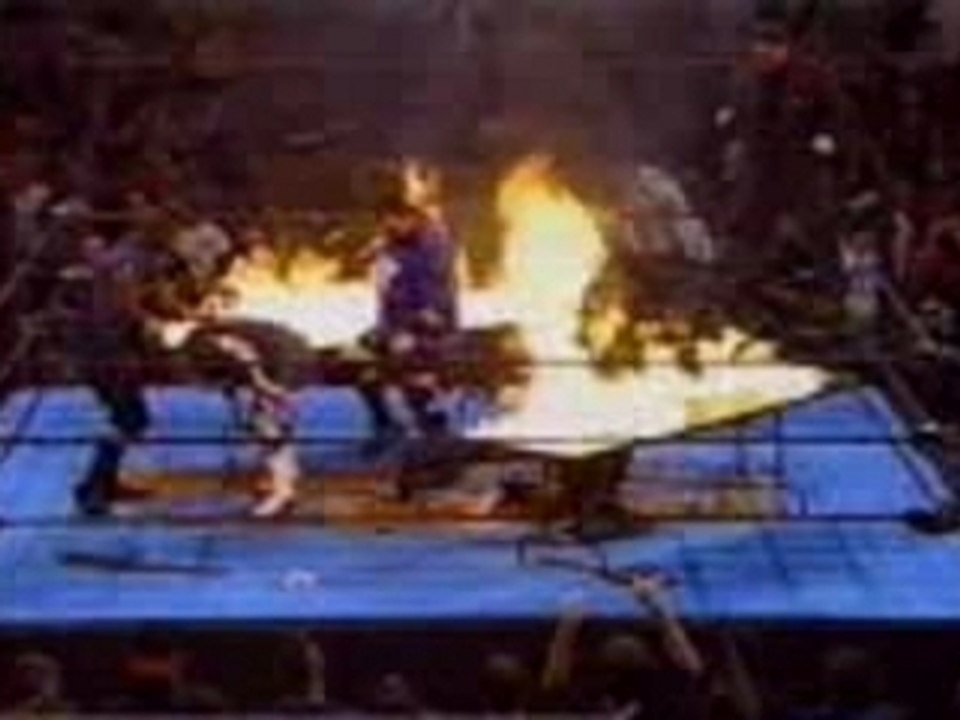 Ecw - dudley boys powerbomb spike through a flaming table