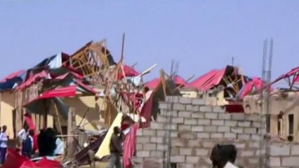 Twin bomb blasts kill as many as 20 people in Somalia