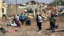 Twin bomb blasts kill as many as 20 people in Somalia