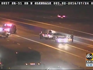 Man arrested after beating driver on freeway