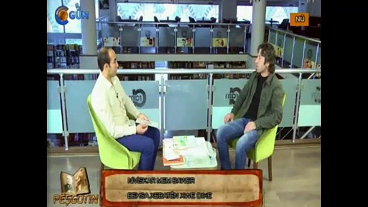 Nivîskar Mem Bawer qala xebat û pirtûkên xwe dike. Bernameya Pêşgotin a Gun tvyê 10ê 5a 2015an. -20150510-172207_446