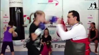Young Girl Pounds the Pads