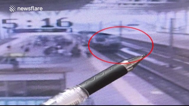 Man pushed onto train tracks escapes being run over