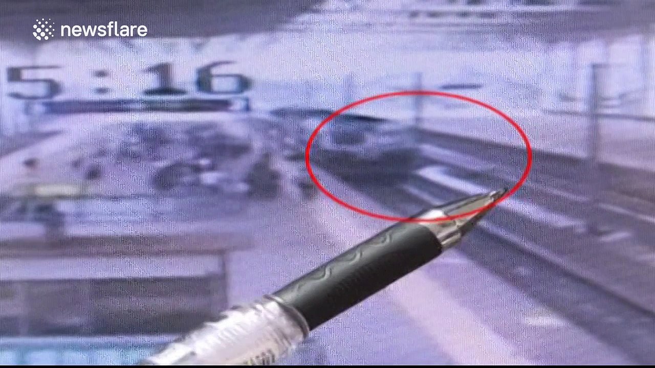 Man pushed onto train tracks escapes being run over