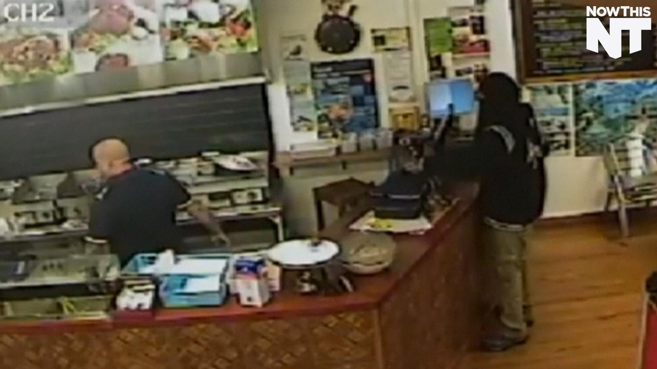 Watch This Shop Owner Completely Ignore An Armed Robber