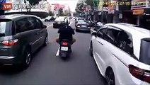 Taiwanese driver doors a scooter, then justice is served