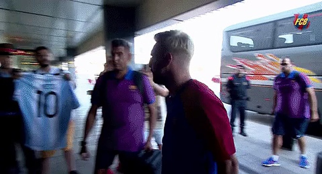 Blonde Leo Messi signs an Argentina shirt before travel to England