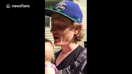 Baby laughs hysterically at puppy playing fetch