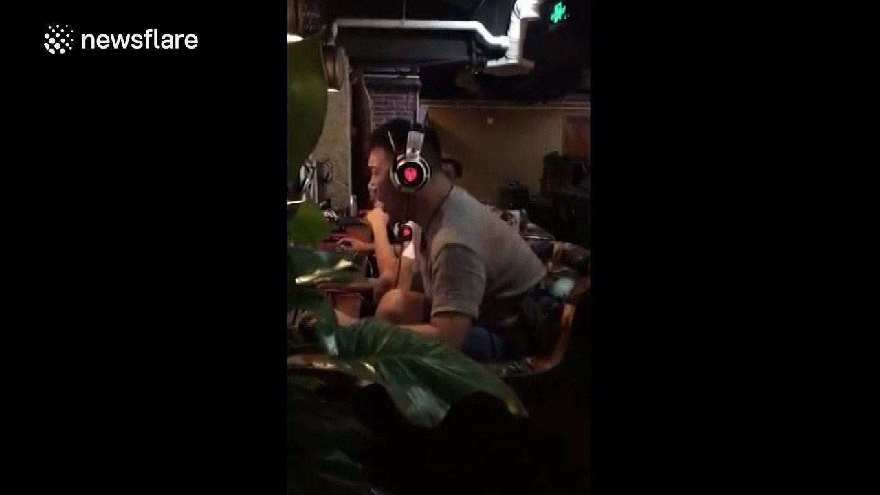 Man makes bizarre noises while playing computer game