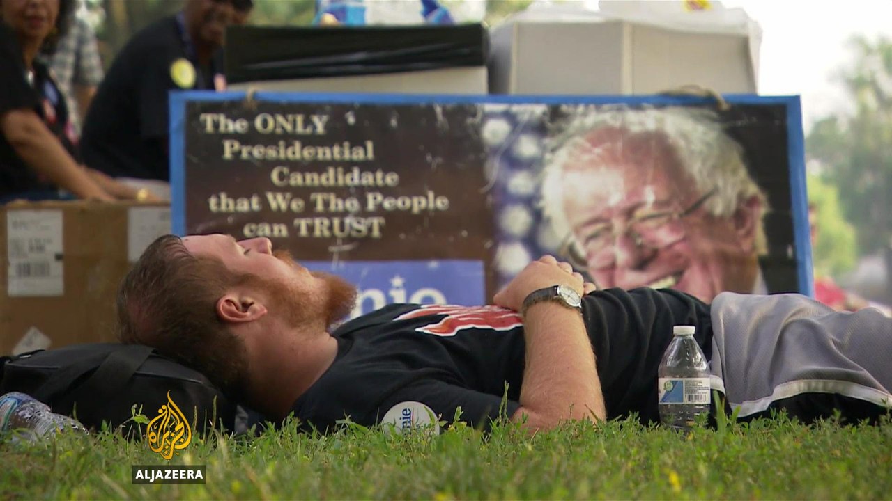 US election: Bernie supporters take to Philadelphia streets ahead of DNC