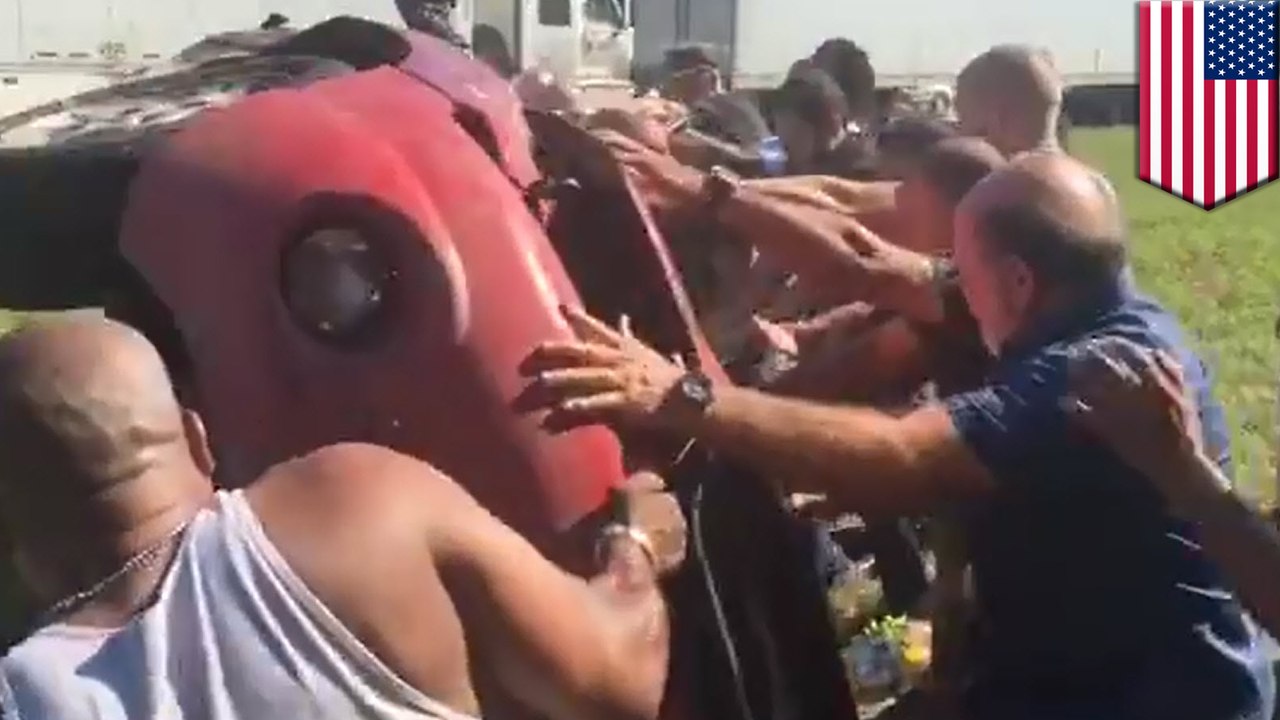 Strangers save man from car crash: Good Samaritans flip car to rescue trapped driver - TomoNews