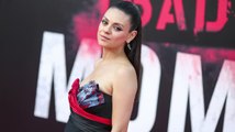Mila Kunis Shows off Baby Bump at 'Bad Moms' Premiere
