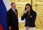 Putin recibe a los atletas rusos acusados de doparse