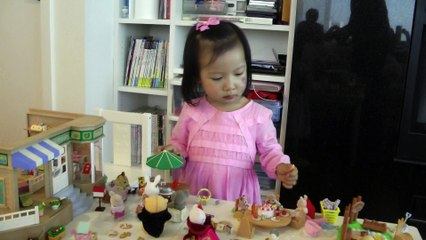 Girl And Sylvanian Families