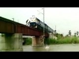 Young boys jump off bridge seconds before train passes through